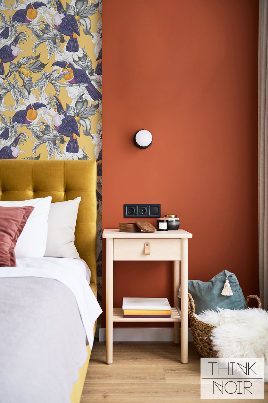 Tropical bird yellow print wallpaper in bedroom interior