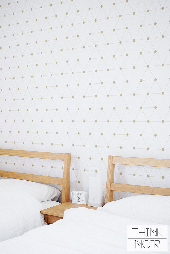 neutral kids room interior with geometric wallpaper design