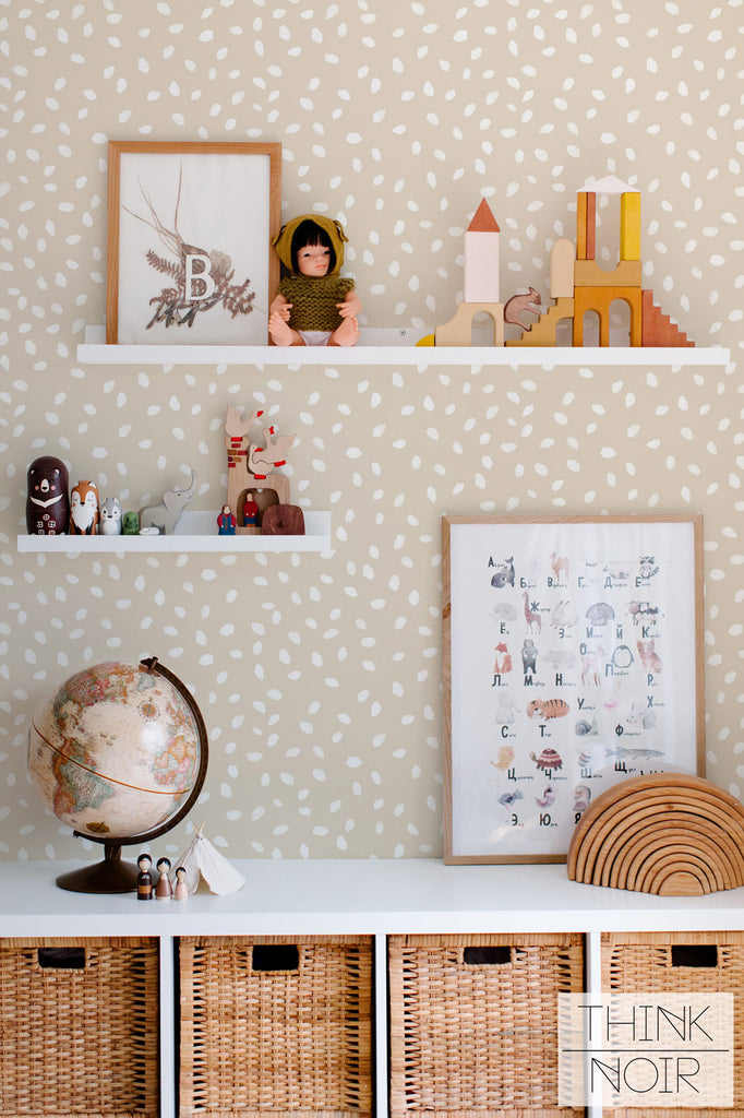 watercolor spot print wallpaper in neutral beige for kids bedroom space