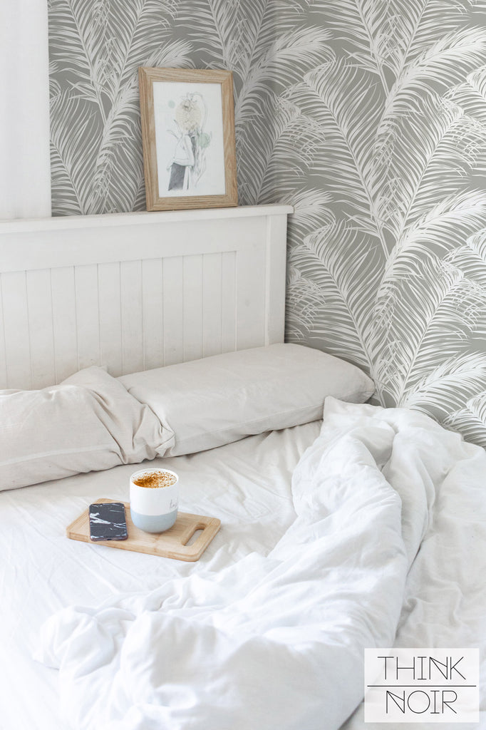 Light grey color removable wallpaper with tropical design in coastal bedroom interior