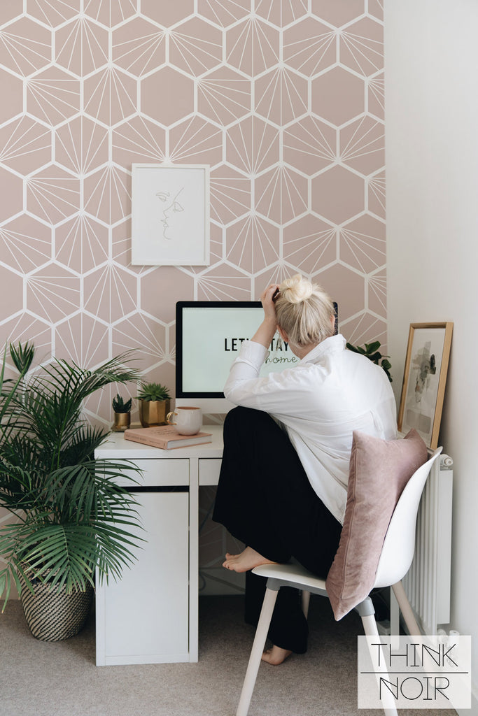 pink geometric shape wallpaper in cool office space