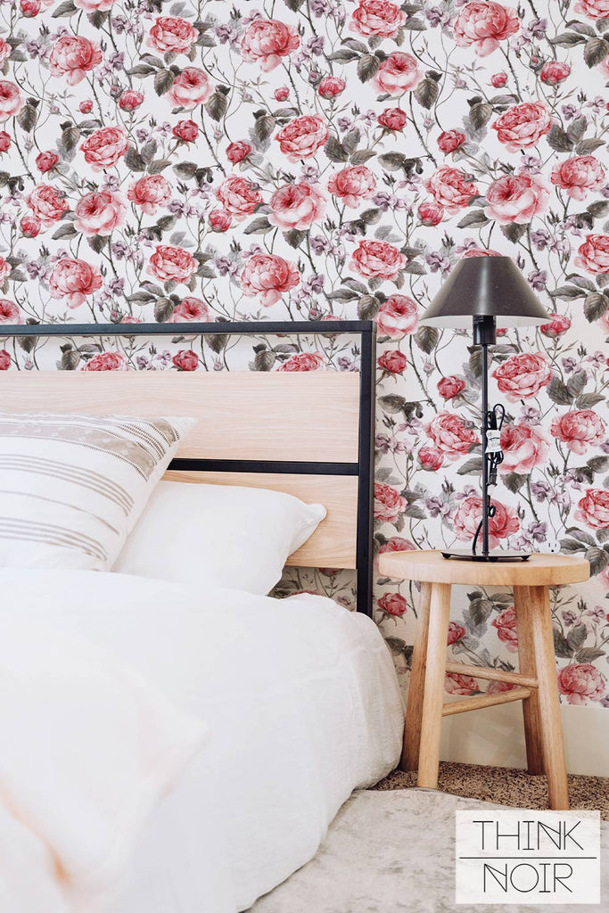 Feminine bedroom with floral accent wallpaper