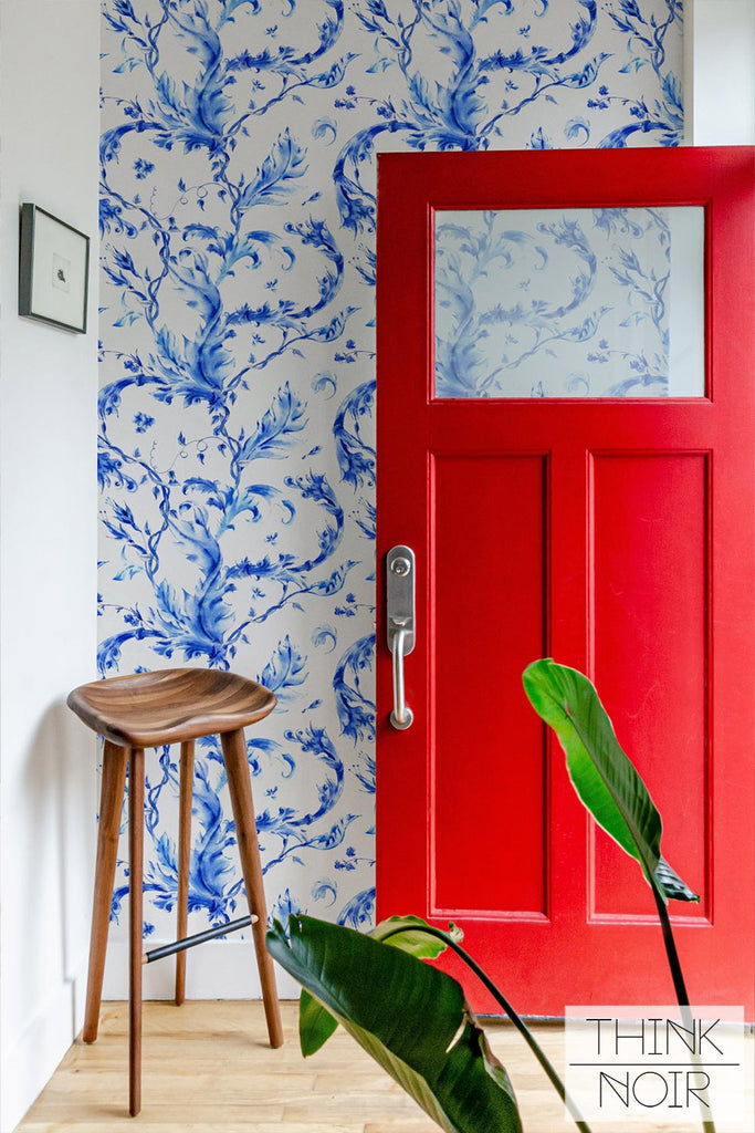 colorful home entrance with blue victorian print wallpaper