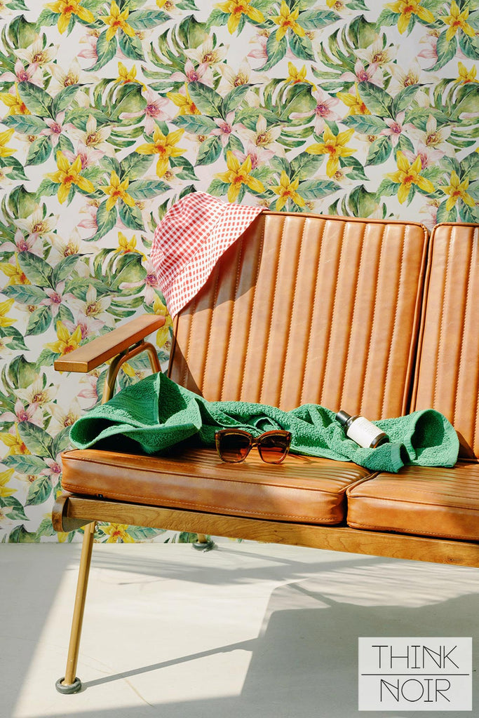 retro brown leather chair in living room interior with tropical removable wallpaper with florals