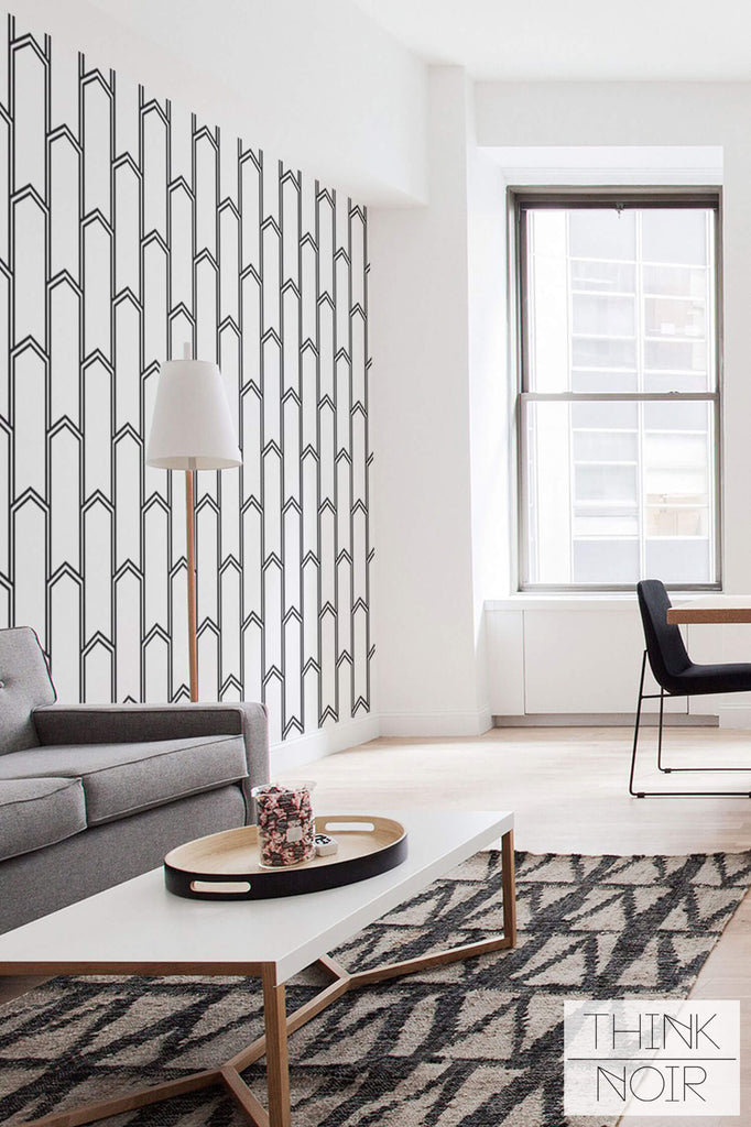 modern and minimalistic living space with simple art deco inspired wallpaper