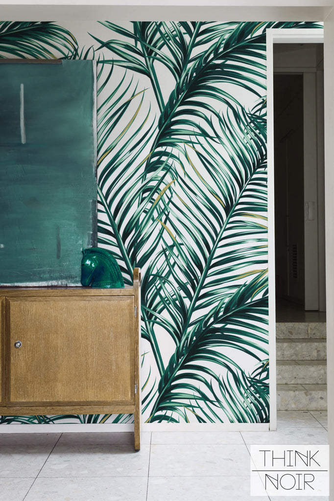 LArge Tropical leaves accent wall mural in living room interior