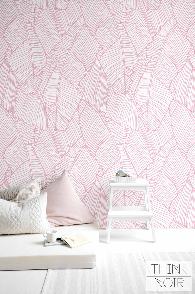 light kids room interior with pink tropical wallpaper design as accent wall
