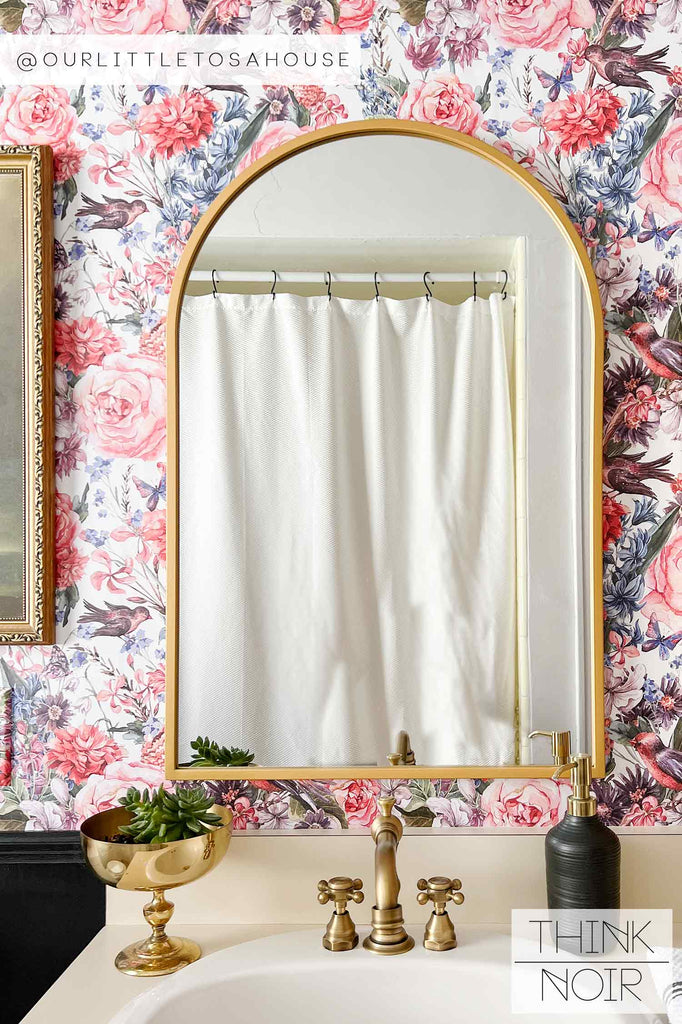 Feminine bathroom interior with floral wallpaper accent wall