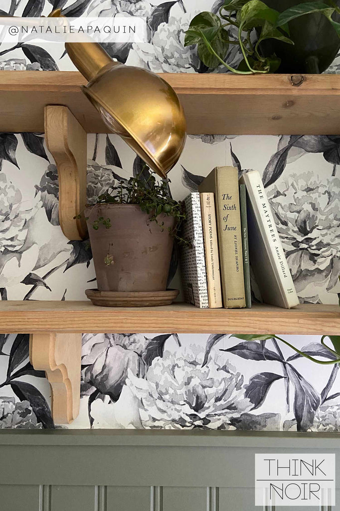 vintage bookshelf background with grey floral wallpaper