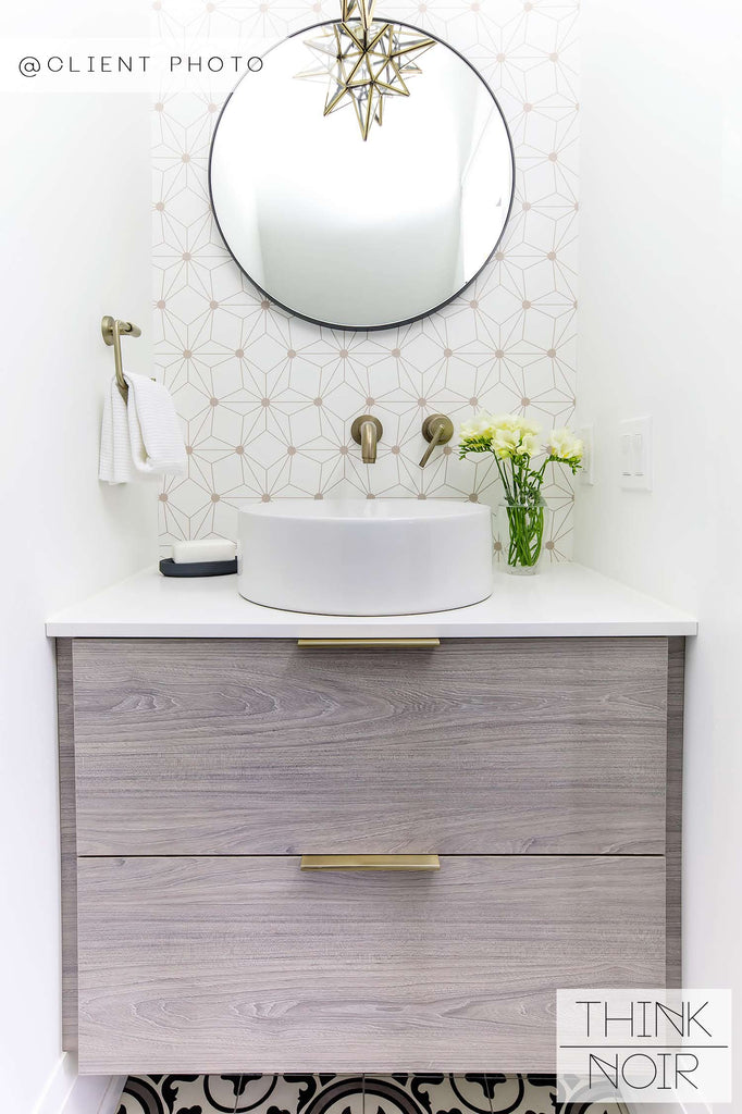 luxury white bathroom with geometric removable wallpaper